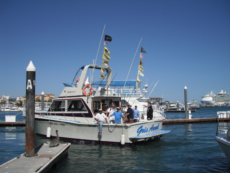 42 ft "Gris Annel" returning with Marlin and Dorado flags flying for a great day fishing Cabo. 