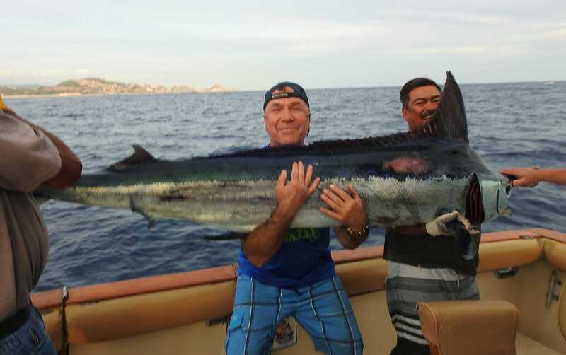 Happy Angler and Skipper with rare large Black Marlin release on "El Dorado VII"