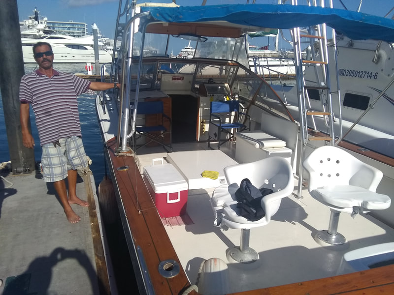 Two fighting chairs with plenty of room to fish on 29 ft Ivonne.