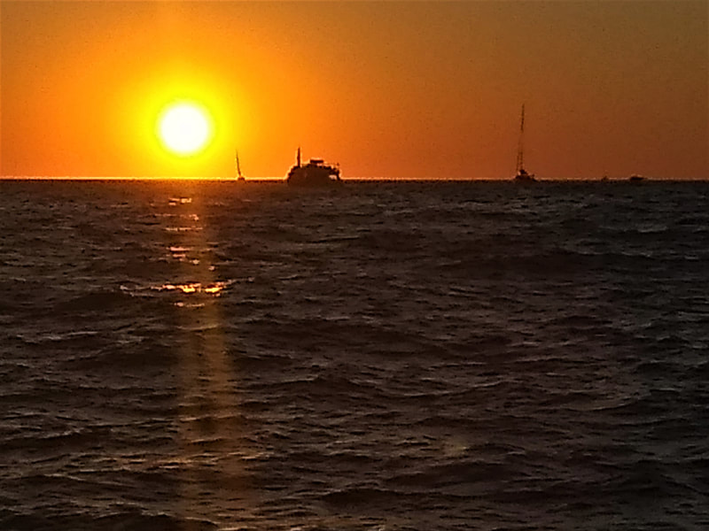 Beautiful Cabo Sunset on the water. 
