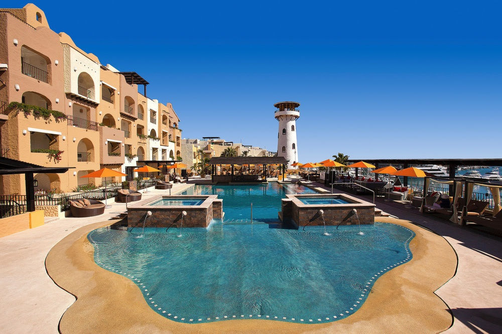 Pool side at Tesoro Resorts sky pool overlooking the Cabo San Lucas Marina.